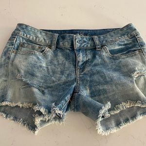 American Eagle - Size 4 - Mid Rise light wash distressed shorts